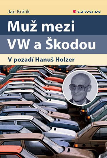 MUŽ MEZI VW A ŠKODOU V POZADÍ HANUŠ HOLZER